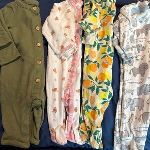 Set of Four Baby Onesies in Various Patterns